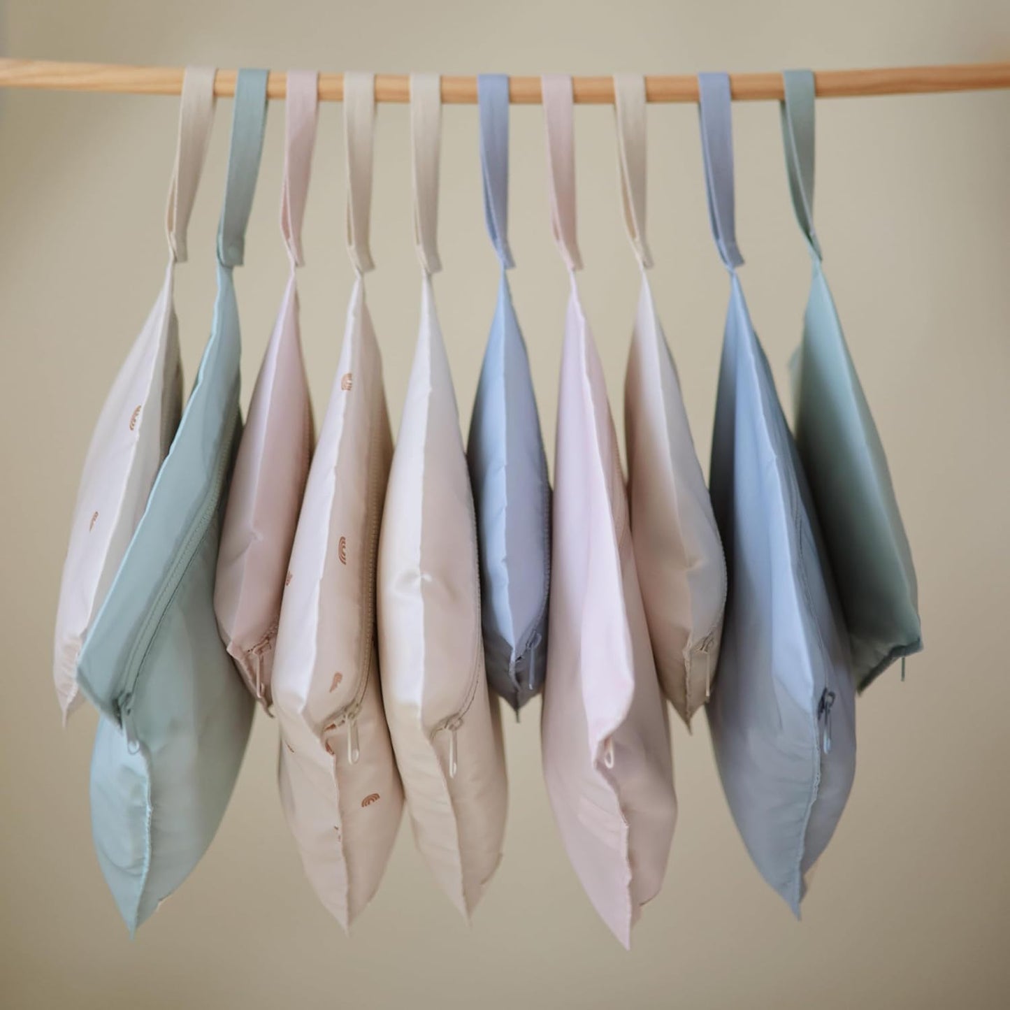 mushie Water Resistant Wet Bags | Large & Small Reusable Storage Bag for Baby Items and Travel | Zippered Pockets with Handle | Machine Washable, Set of 2 (Rainbows)