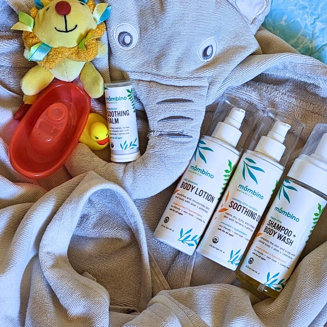 Mambino Organics Baby Arrival Essential Care Gift Set - Organic Baby Care Kit - Vegan & Cruelty-Free 4pc Set - Shampoo, Lotion, Soothing Oil & Balm - Ideal Organic Baby Gift Set for New Moms