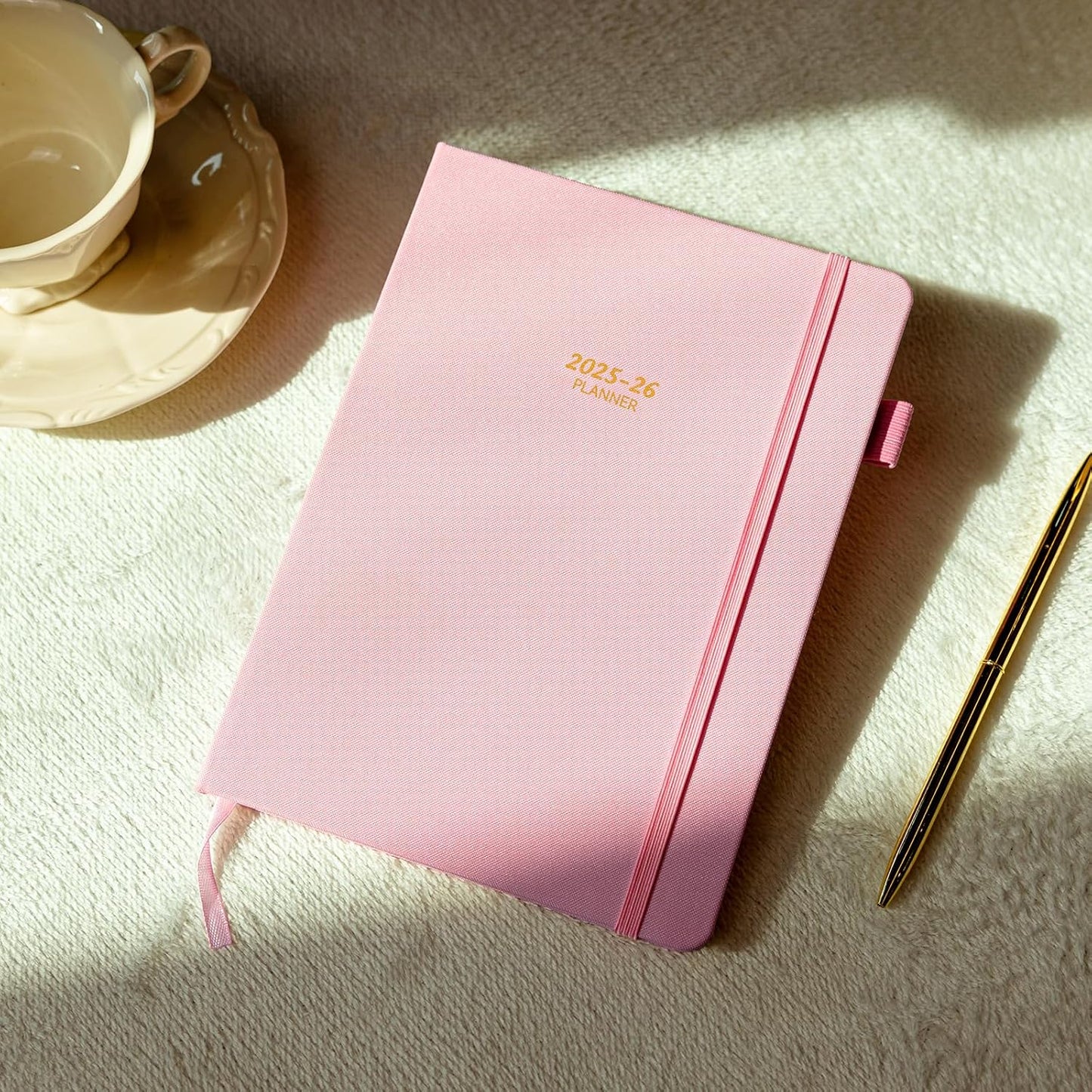 Getink 2025-2026 Linen cover Planner Weekly & Monthly Daily Agenda Book,2025-2026 To Do List Notebook with Colorful Monthly Tabs, Inner Pocket, Elastic Closure (Pink,5.5 * 8.5)