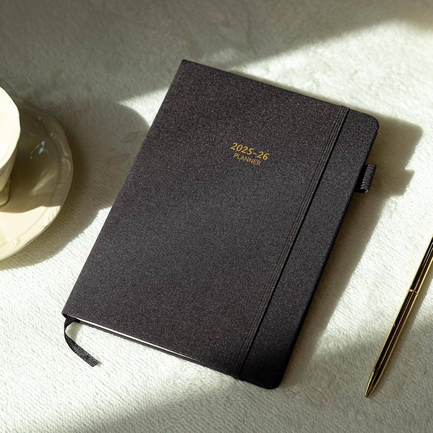 Getink 2025-2026 Linen cover Planner Weekly & Monthly Daily Agenda Book,2025-2026 To Do List Notebook with Colorful Monthly Tabs, Inner Pocket, Elastic Closure (Black,5.5 * 8.5)